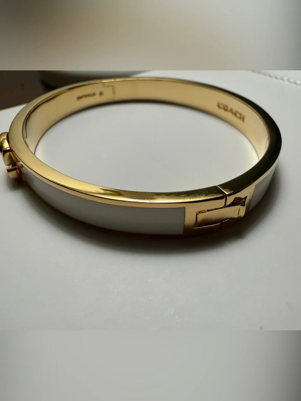COACH Gold-Tone and Cream Enamel Hinged Bangle Bracelet
